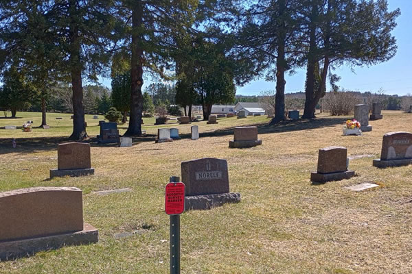 Image of headstones in the Cemetery
